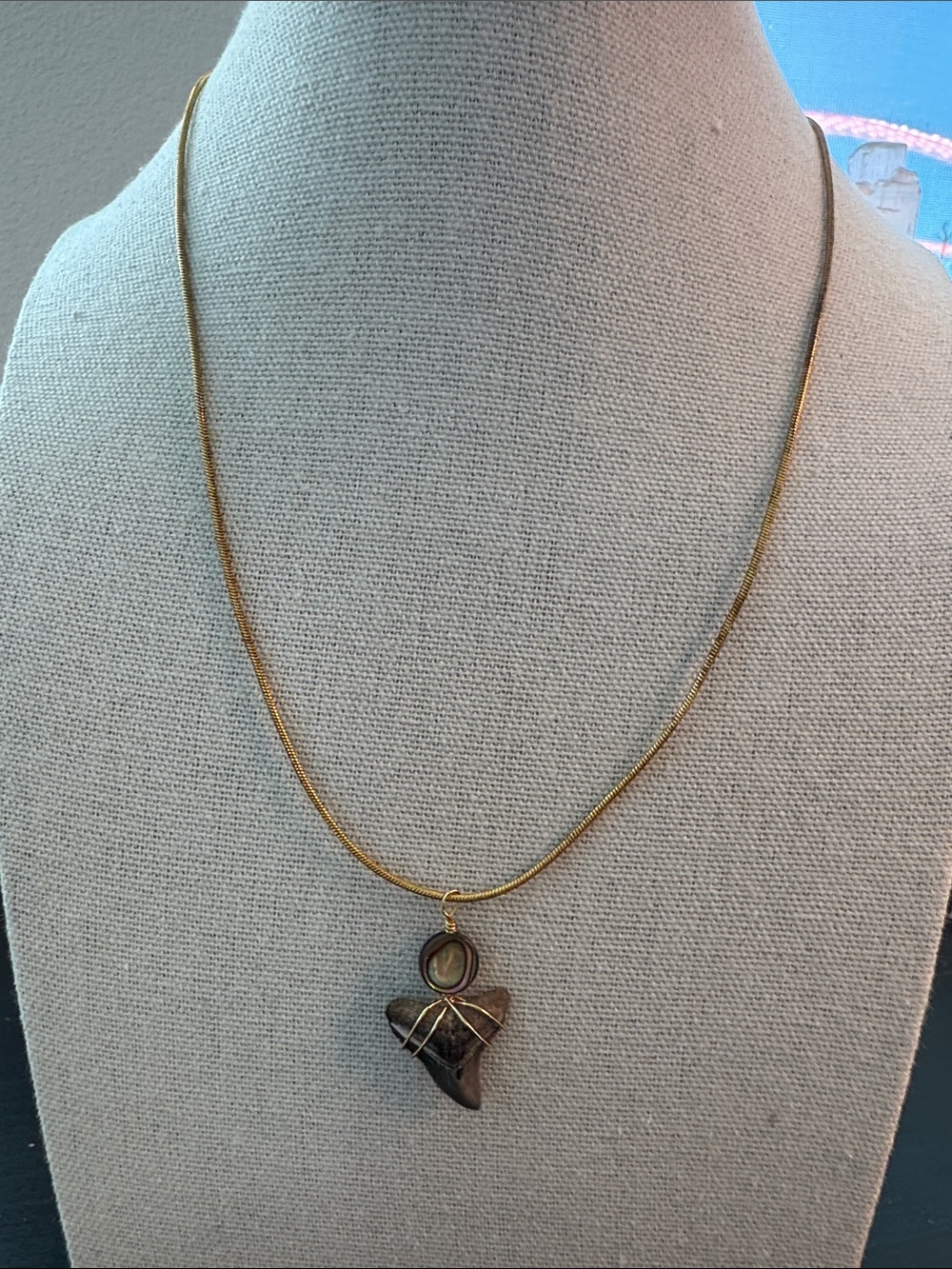 Gold Tone Pendant Necklace with Brown Shark Tooth Charm